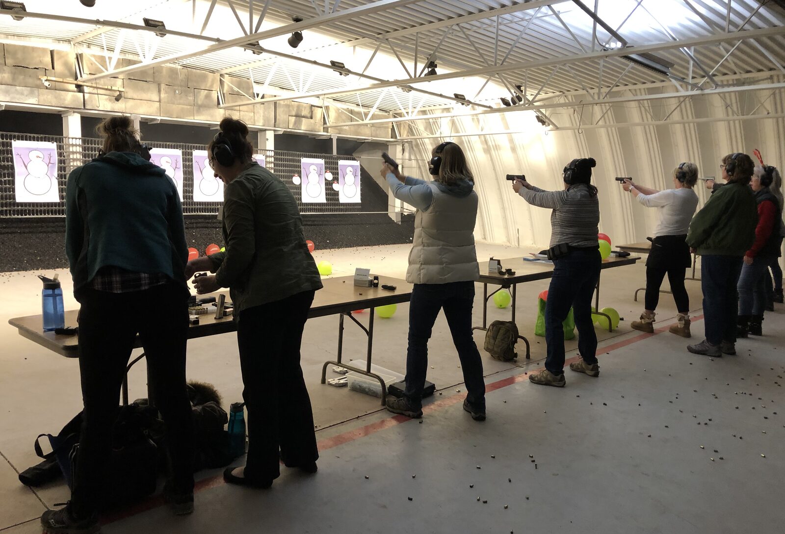 Women practicing on the range at the Boulder Rifle Club